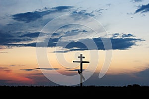 Cross silhouette with the sunset