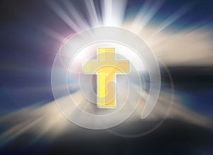 Cross on a sky with dramatic light, clouds, sunbeams. Easter.