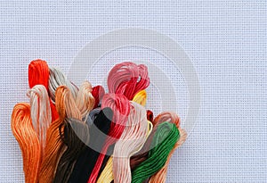 Cross stitch fabric and colorful thread