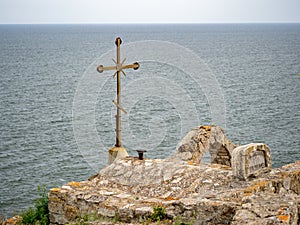 Cross on a stone church at Kaliakra. Kaliakra is a cape in the Southern Dobruja region of the northern Bulgarian Black Sea Coast photo