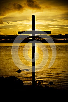 Cross in sunset photo