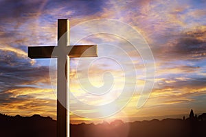 Cross at sunset, crucifixion of Jesus Christ