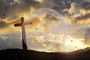 The cross with sunset in the sky