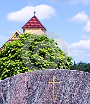 Cross on the tombstone