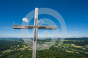 A cross on the top of the Oresnik rock lookout in the Jizera Mountains