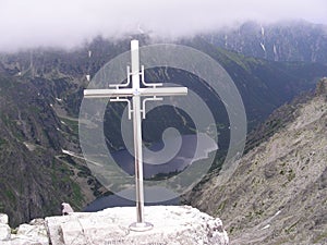 A cross, the top Rysy, the Tatra Mountains