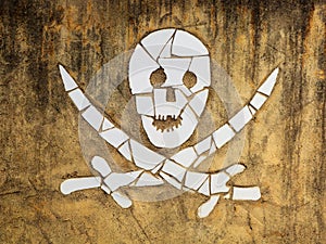 Crossbones known as the Jolly Roger on a mosaic wall