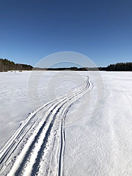 Crosscountry skiing on A Finnish lake