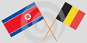 The crossed Belgium and North Korea flags