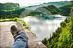 Crossed feet lake aerial bled slovenia relax travel