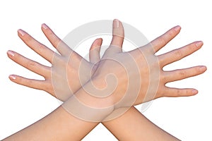 Crossed female hands with stretched fingers