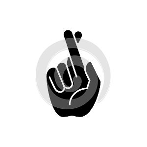 Crossed fingers black glyph icon