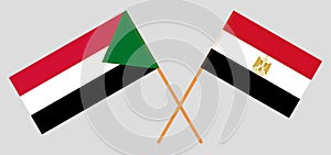 Crossed flags of Egypt and Sudan