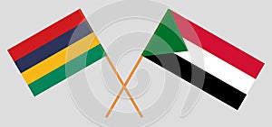 Crossed flags of Mauritius and Sudan