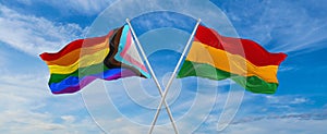 crossed flags of progress lgbt pride and Black history month USA and Canada flag waving in the wind at cloudy sky. Freedom and