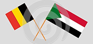 Crossed flags of Sudan and Belgium