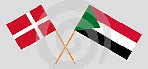 Crossed flags of Sudan and Denmark