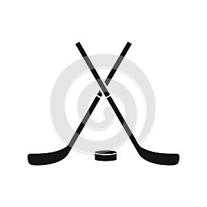 Crossed hockey sticks and puck icon, simple style