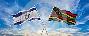 crossed national flags of Israel and Black history month USA and Canada flag waving in the wind at cloudy sky. Symbolizing