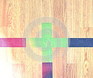 Crossed playground lines in corner, painted green cross