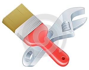 Crossed spanner and paintbrush tools