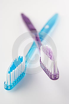 Crossed toothbrushes