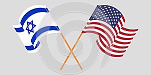 Crossed and waving flags of Israel and the USA photo