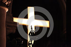 Crosses, crown, light and shadow in the Cathedral of Notre-Dame de Paris