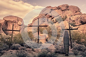 Crosses in desert rocky boulder locatio