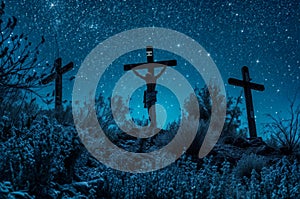 Crosses at night with starry sky in the background. Conceptual image