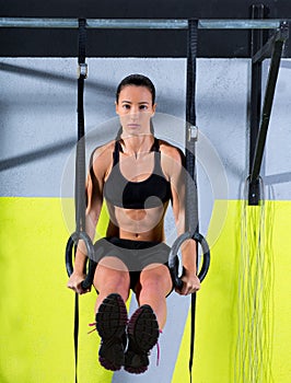 Crossfit dip ring woman workout at gym dipping