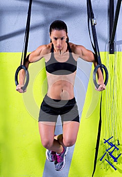 Crossfit dip ring woman workout at gym dipping