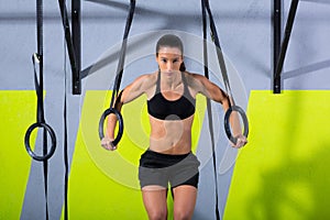 Crossfit dip ring woman workout at gym dipping