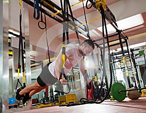 Crossfit fitness TRX push ups man workout