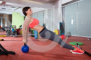 Crossfit fitness woman push ups kettlebell pushup exercise