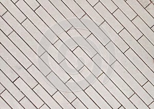 A crosshatch pattern of slender bricks.