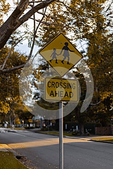 Crossing Ahead sign on a road