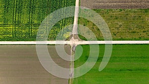 Crossing of dirt roads with several fields seen from a drove pov, Germany