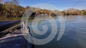 Crossing the Ebro River at Miravet in the traditional car ferry