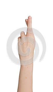 Crossing fingers for luck, hand gesture isolated on white