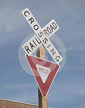 Crossing railroad street sign