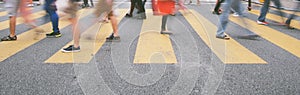 Crossing the road on zebra line photo