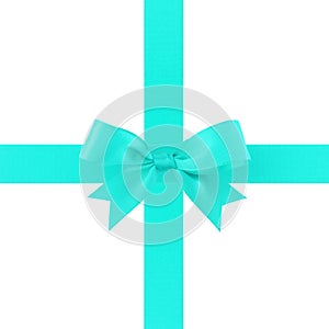 Crossing turquoise ribbon with bow isolated on white background