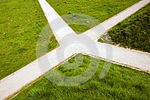 The crossroad in the country and green grass