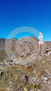 Crossroad on the mountain peak Italian Alps