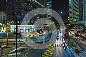 Crossroad at Night in La Defense Business District Paris With Moon