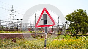 Crossroad sign on the road with attractive road sign and symbols. Right moving turn on the road with green boulevard path