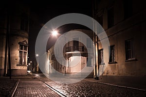 Crossroads of narrow streets in night Vyborg