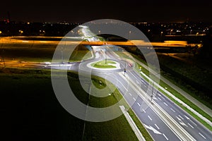 Crossroads and roundabout at night.