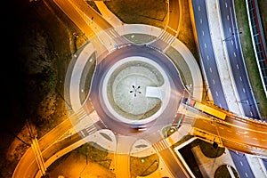 Crossroads and roundabout at night.